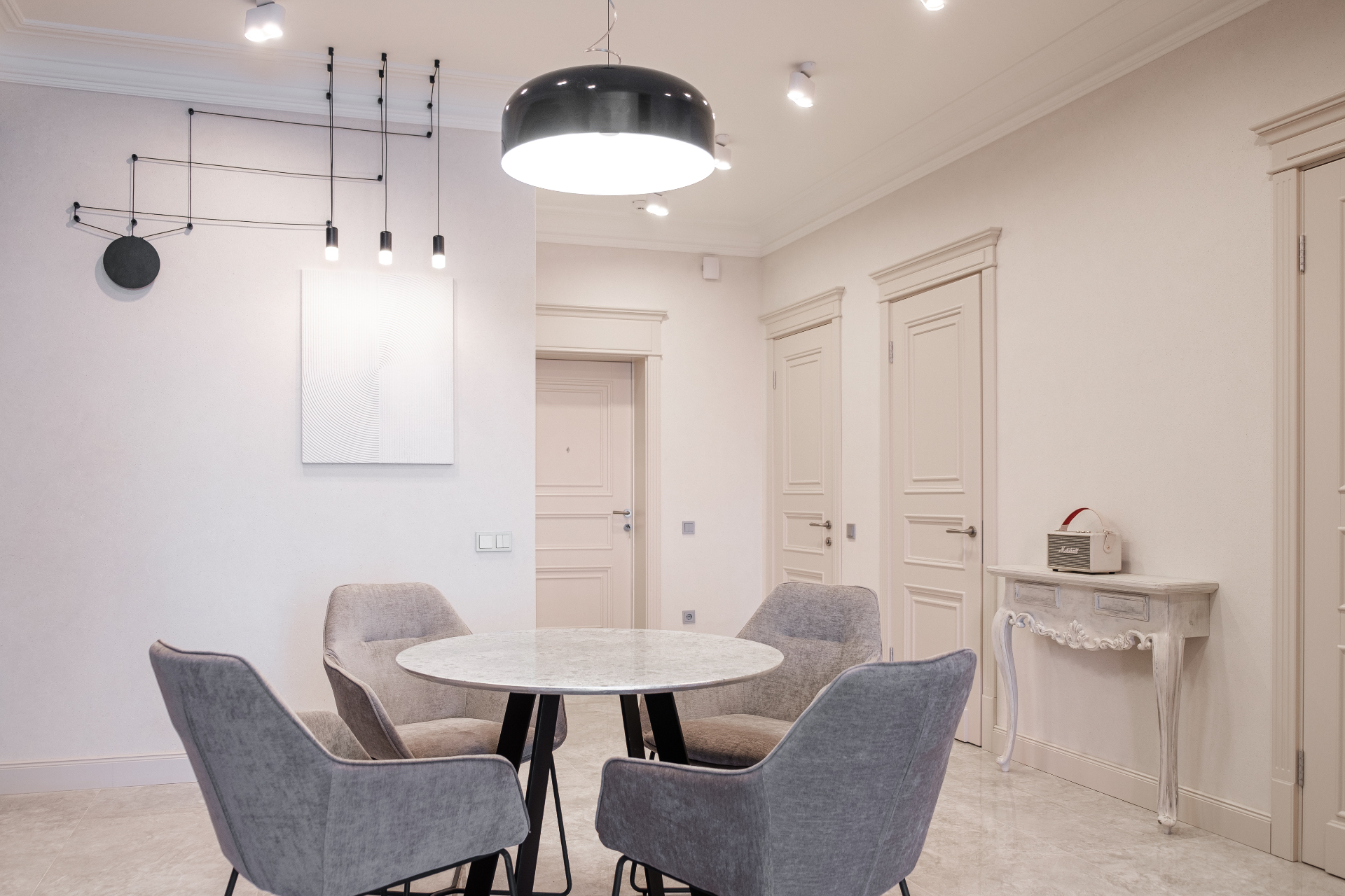 Private dining room with sculptural lighting